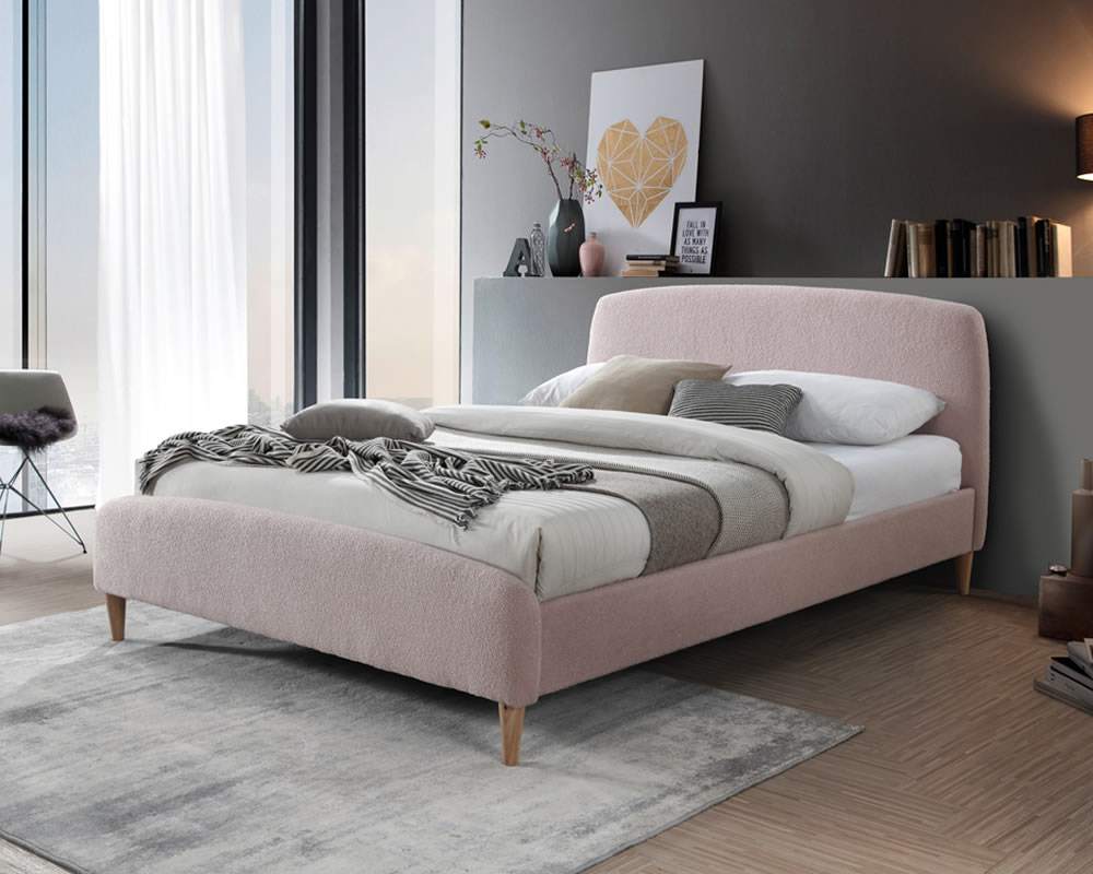 View Otley 46 135cm Double Modern Pink Fabric Bed Frame With Curved Headboard And Foot Board Tapered Lightwood Legs Sprung Slatted Support information