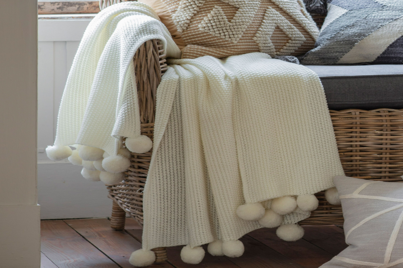 View Cream Moss Stitched Knitted Throw With Pom Pom Design 1700 x 1300mm Waffle Knitted Fabric Can Be Used On Bed Or Chair Modern Design information