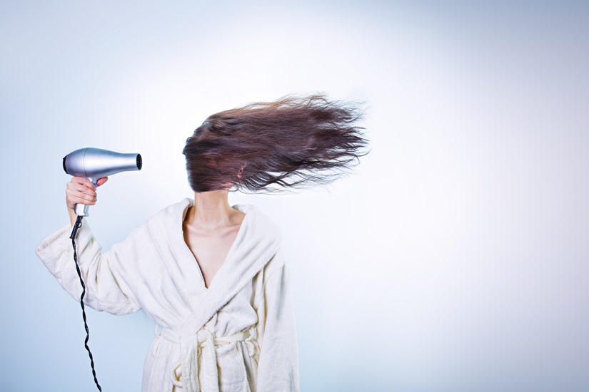 women with hairdyer