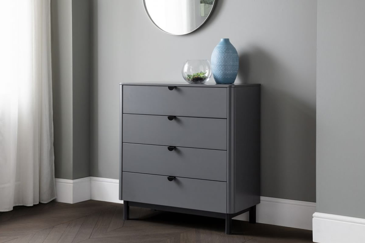 View Modern Grey 4 Wide Drawer Bedroom Storage Chest Modern Retro Style Rounded Corners Satin Grey Finish Black Pull Handles Chloe Julian Bowen information